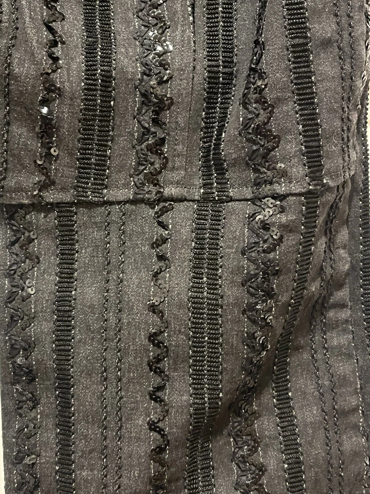 De colección. Pantalones de lentejuelas acampanadas Nanette Lepore negros EE. UU. 10 (34 X 30) tiro bajo usados Foto 3 de 4