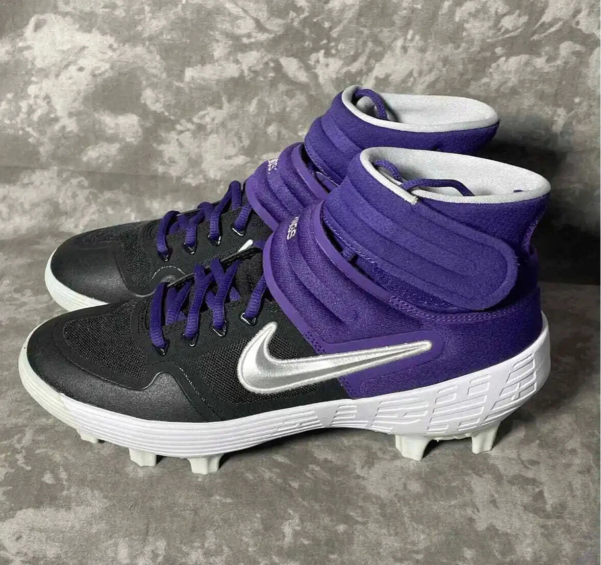 Purple youth sales baseball cleats