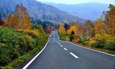 Landscape road hills fall red leaves asphalt Custom Gaming Mat Desk