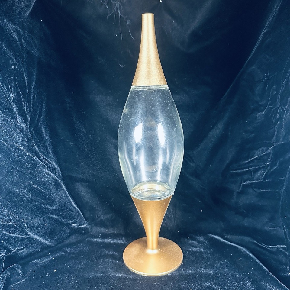 A 1950s Atomic Era 'rocket ship' whiskey decanter — pure Space Age kitsch in the best possible way, and instantly a conversation piece on any bar cart.