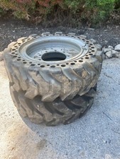 2 - Tongyong 30x10-18 Solid Flex Lift Tireswheels On 9 Lug Rims - Heavy Duty