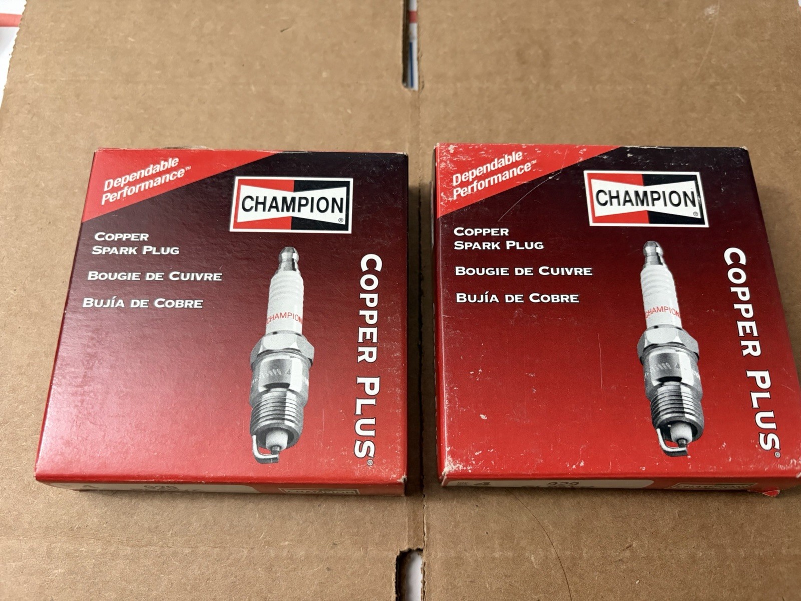2- 4 Count Champion Copper Plus 929 RL95YC Spark Plugs NEW 