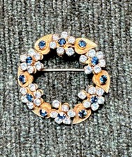 Vintage Gold-tone Wreath Brooch Featuring Various Shades Of Blue Rhinestones