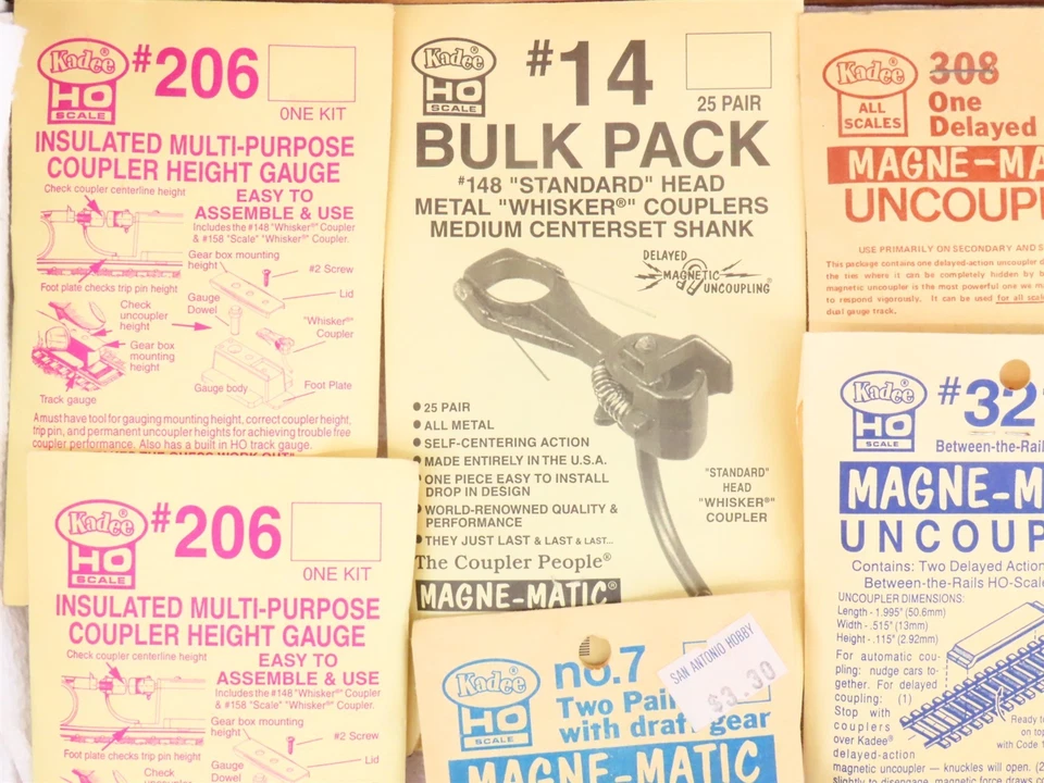 LOTE de 18 paquetes de acopladores y desacopladores Kadee a escala HO Foto 2 de 4