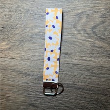 Handmade Sewn Floral Keychain with Yellow and Purple Accents