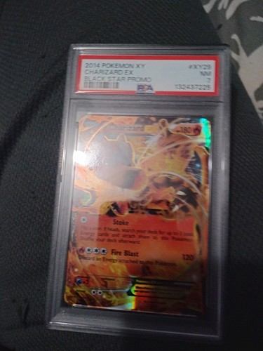 Charizard-EX graded PSA 7 for sale on eBay