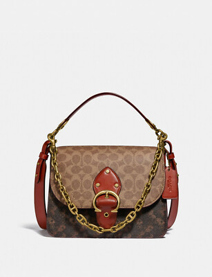 beat crossbody clutch in signature canvas with horse and carriage print