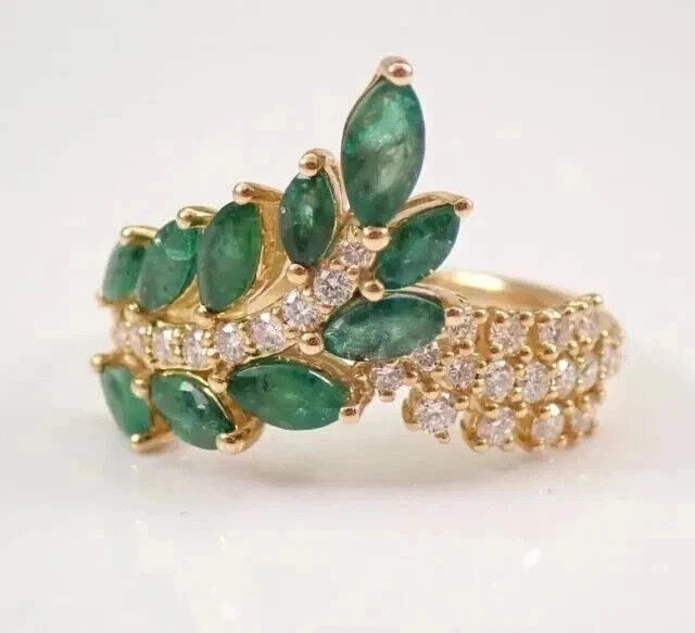 Anillo de hoja de esmeralda simulada de corte marquesa de 3,00 quilates enchapado en oro amarillo de 14 quilates Foto 2 de 3