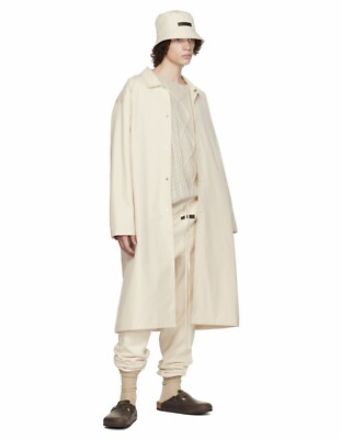 【M】 FOG Fear of God Essentials Long Coat Fear of God Essentials Off Black Long Coat | PacSun