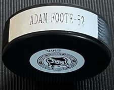Adam Foote Autographed Hockey Puck - Columbus Blue Jackets w/ No COA