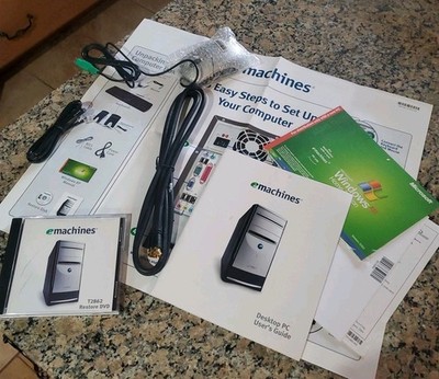 E Machine Accessories-Power cord, RJ11 cable, Mouse, Restore disk, E-Z Setup 