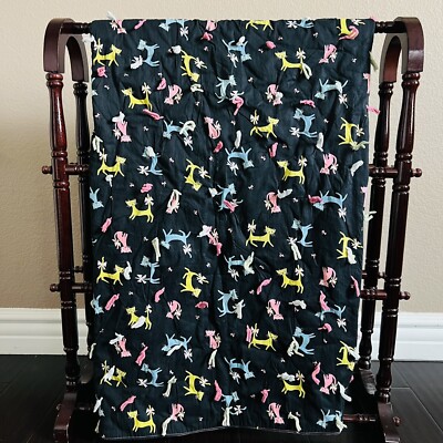 Quilted throw for cat lovers.