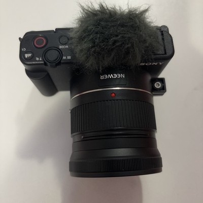 Sony ZV-1 with An Additional Lens and flash