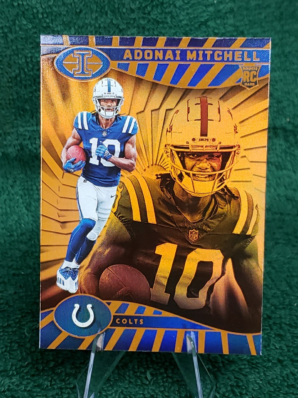 2024 Panini Illusions Orange Trophy Collection Rookie Adonai Mitchell #36 (RC)