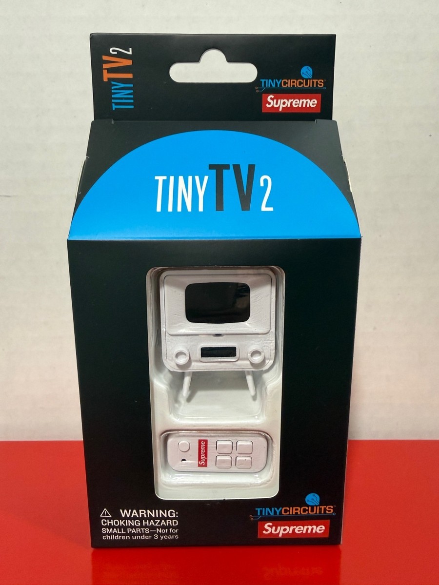 Supreme Tiny TV 2 Mini Television With Remote In Hand Ready To