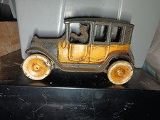 ANTIQUE 1920s ARCADE CAST IRON YELLOW TAXI CAB WITH BOLTED IN DRIVER