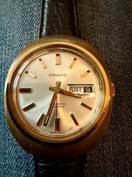 Montre Orano NOS Swiss Made Automatique day date vintage