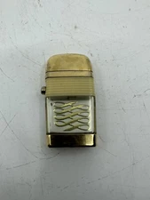 VINTAGE SCRIPTO VU GOLD TONE SMALL LIGHTER WHITE BAND WITH FANCY SYMBOLS