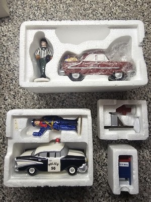 Snow village Department 56 assortment ofVintage ceramic accessories.