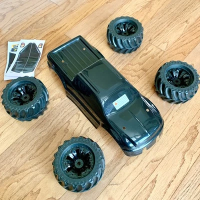 Traxxas E-Maxx Body & Tire Combo - New! 3.8” Black Wheels, 17mm Hex, Black Body - Image 1 of 4