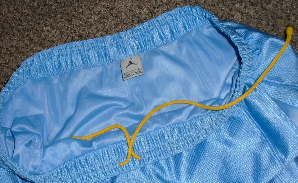 Pantalones Cortos de Baloncesto Marca Nike Jordan Talla Grande Bolsillos Azul/Amarillo Gris Etiqueta Foto 3 de 4