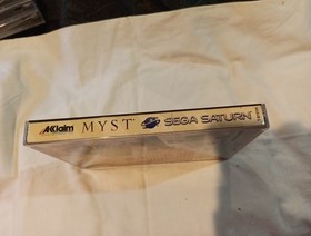 Sega Saturn Myst Complete With Registration Card And All Authentic Art Work.
