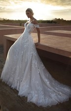 wedding dress Pronovias Elysses size 12 off white/ nude