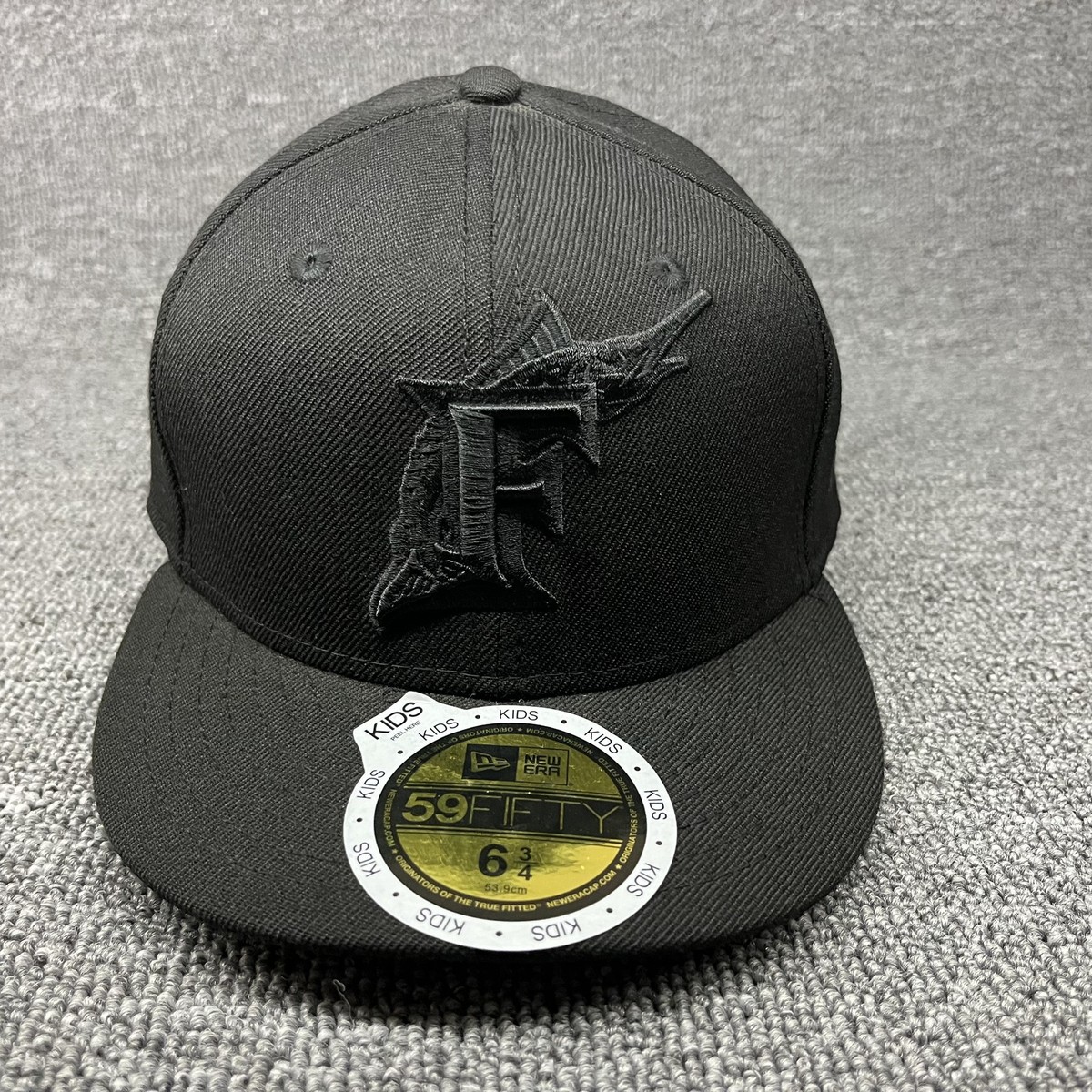 New Era 59FIFTY Florida Marlins Black on Black Kids Fitted Hat Size 6 3/4