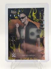 RICKY SAINTS 2025 WWE TOPPS CHROME CACTUS JACK BLACK AND YELLOW FLAME REFRACTOR