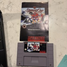 SNES Stanley Cup game cartridge with instruction manual