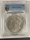1902 MORGAN DOLLAR PCGS AU50 Gold Shield