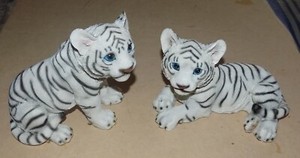 TWO BLUE-EYED WHITE TIGER CUBS PORCELAIN FIGURES