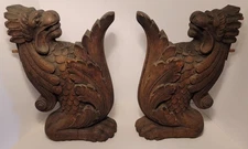 Large Pair of Antique Architectural Salvaged Tiger Oak Winged Griffin Corbels