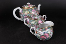 chinese porcelain rose medallion canton teapot, sugar bow and ewer, a set