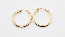 Textured Hollow Tube Huggie Hoop Earrings in 14k Yellow Gold