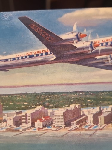 Eastern Airlines Golden Falcon DC-7B Airplane Flying Over Miami Beach Postcard - Picture 2 of 3