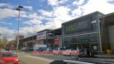 PHOTO  FLOWER DOWN RETAIL PARK B&Q SPORTSDIRECT AND MARKS & SPENCER STORES AT TH