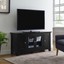 carver 53 in. matte black composite tv stand 55 in. with glass doors