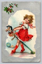 Postcard c1910 Girl Toy Horse Embossed Christmas P364