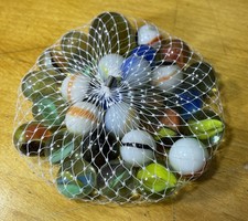 vintage  marbles net bag glass 1 shooter toy game