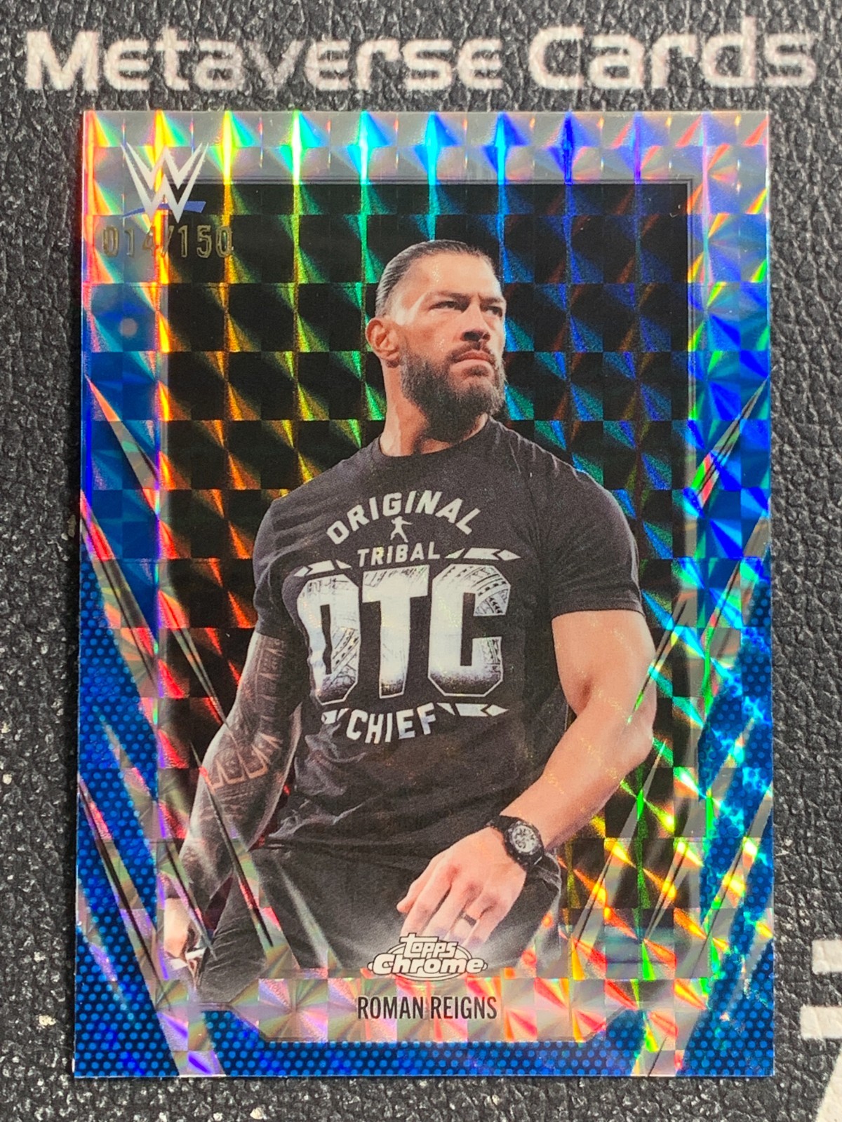 2026 Topps Chrome WWE #18 Roman Reigns Blue Geometric Refractor 014/150