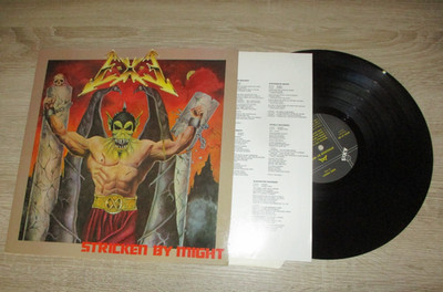 EXE E-X-E Stricken by might Near Mint LP