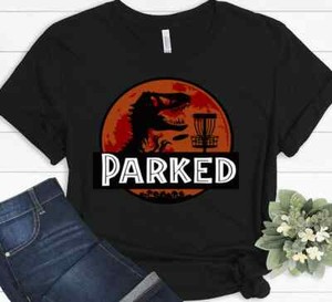 dinosaur golf shirt