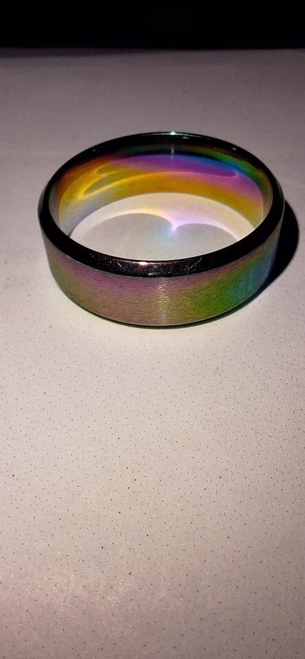 STAINLESS STEEL IRIDESCENT WEDDING BAND. SZ 11-image