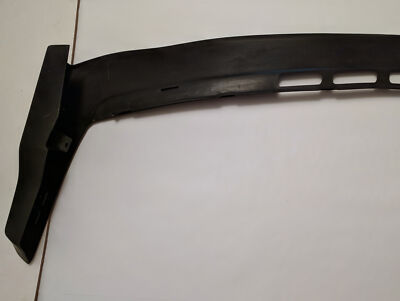 Genuine BMW E28 Bumper side plastic extension. Passenger. Front  