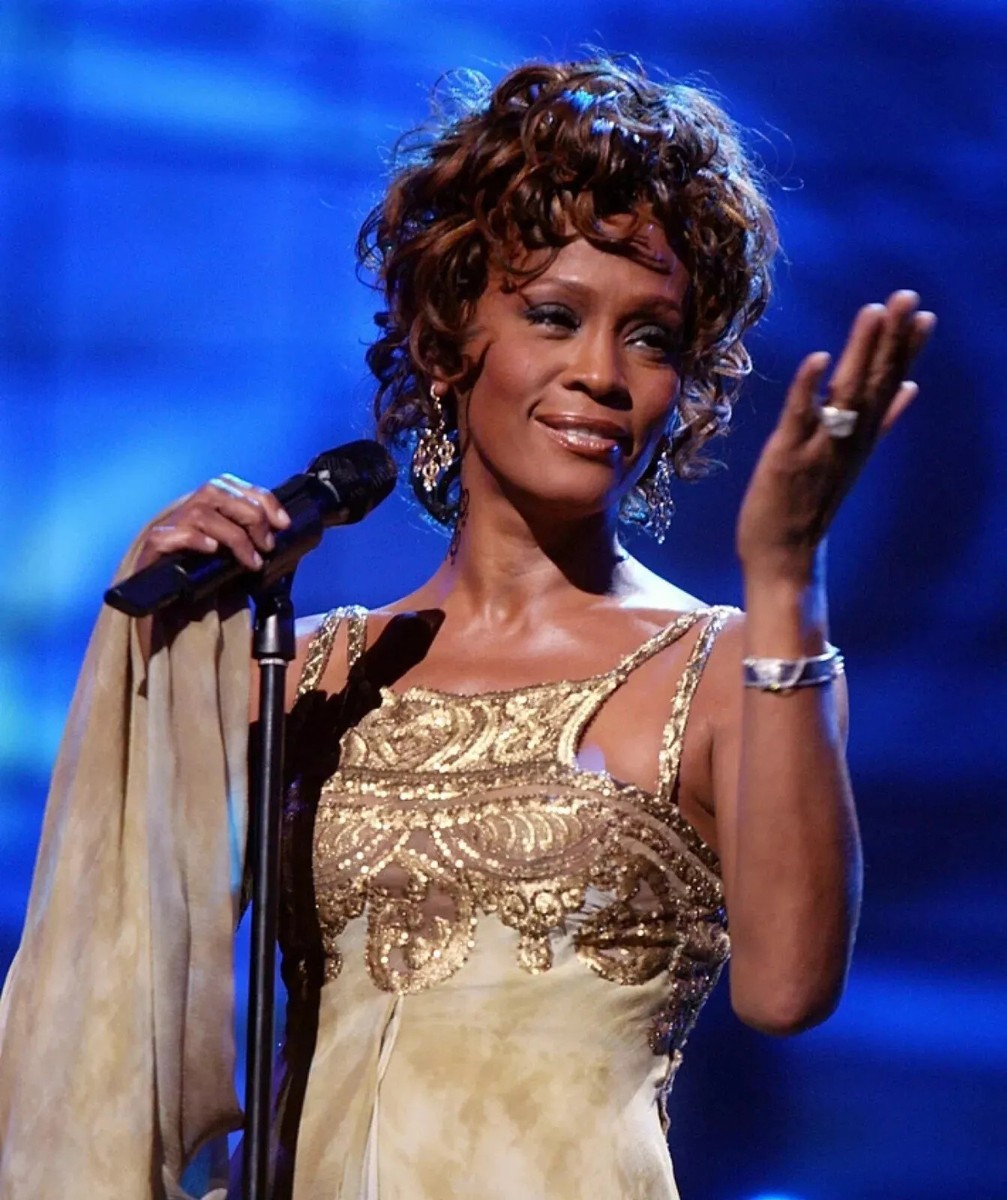 whitney houston gold dress Whitney Houston