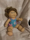 Cabbage Patch Kids Vinyl Doll. Strawberry-blonde Hair, Violet Eyes