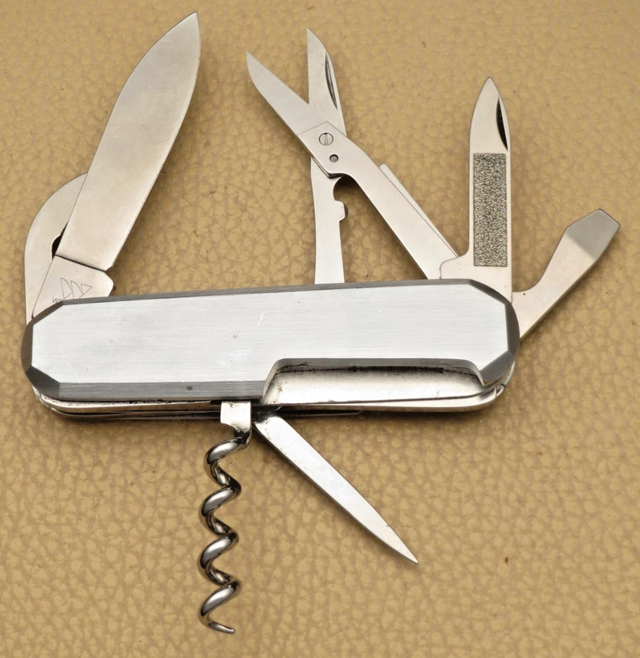 Navaja suiza WENGER de colección de los años 90 - 85 mm METAL 50 - asas de metal bverled Foto 3 de 4