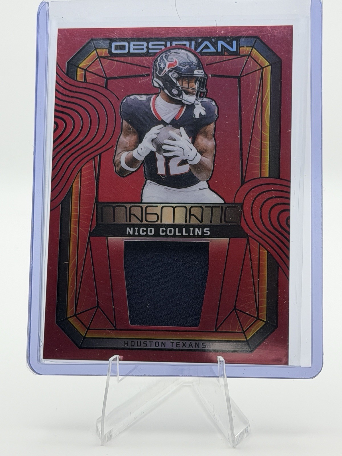 2024 Panini Obsidian Magmatic Memorabilia Nico Collins #MM-NCS Red /75 (MEM)