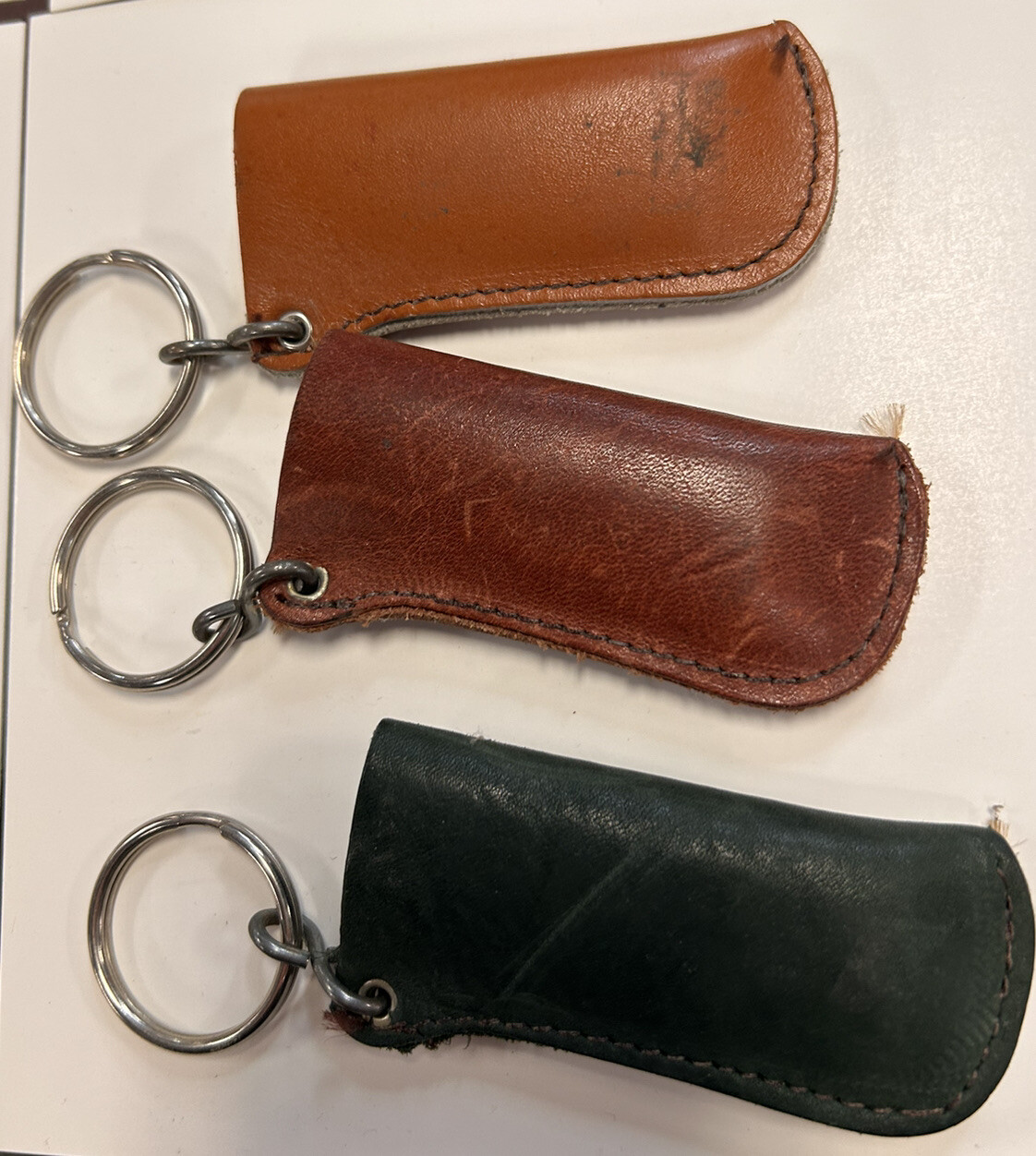 Lot of 3 Vintage Leather Keychain lighter holders Ants, Pretenders  & Foreigner
